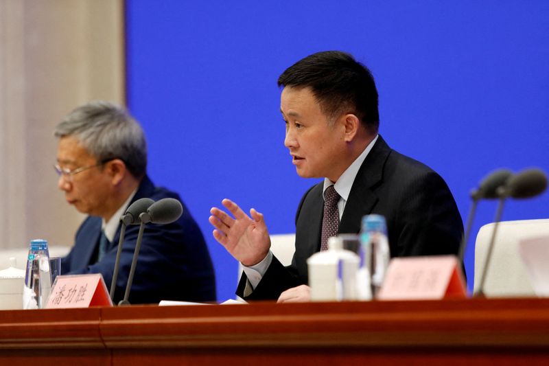 &copy; Reuters. FILE PHOTO: People's Bank of China (PBOC) Deputy Governor Pan Gongsheng speaks next to PBOC Governor Yi Gang at a press conference in Beijing, China March 3, 2023. REUTERS/Florence Lo/File Photo