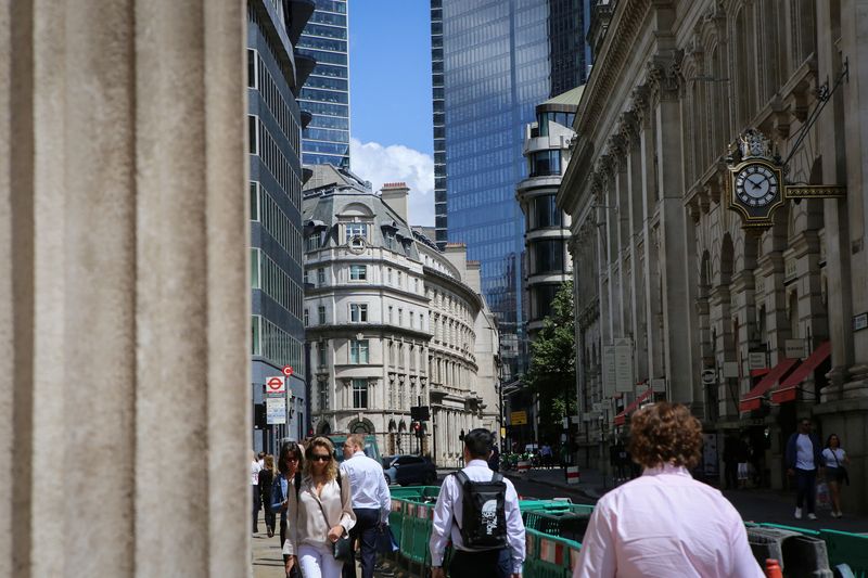 &copy; Reuters. People walk past the Bank of England in London's financial district, as Britain struggles with the highest inflation rate among the world's big rich economies, in London, Britain July 17, 2023. REUTERS/Rachel Adams/File Photo