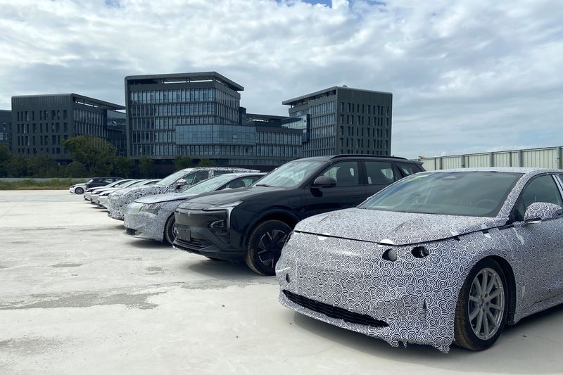 &copy; Reuters. Test cars by Evergrande are parked outside the Evergrande New Energy Vehicle (NEV)'s research center, in Shanghai, China October 6, 2021. Picture taken October 6, 2021. REUTERS/Yilei Sun/File photot