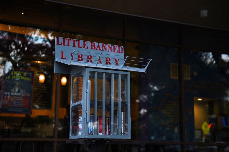 &copy; Reuters. FILE PHOTO: A Little Free Library, the local variation of which has been dubbed "Little Banned Library" and which was designed to look like a prison, invites residents to take books that the library says have been challenged by schools across the state of