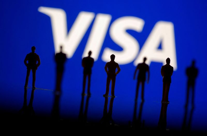 &copy; Reuters. FILE PHOTO: Small toy figures are seen in front of displayed Visa logo in this illustration taken, June 24, 2021. REUTERS/Dado Ruvic/Illustration/File Photo