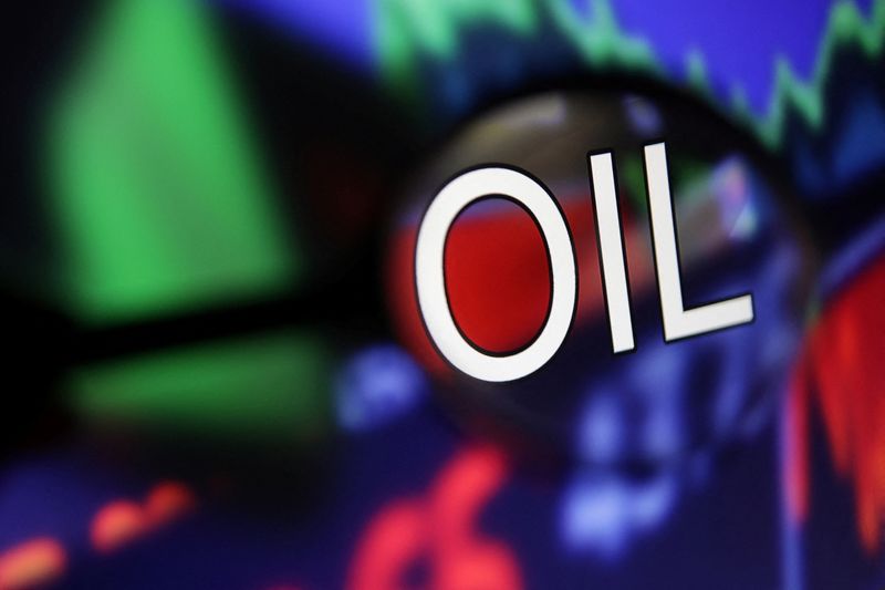 &copy; Reuters. FILE PHOTO: Word "Oil" and stock graph are seen through magnifier displayed in this illustration taken September 4, 2022. REUTERS/Dado Ruvic/Illustration