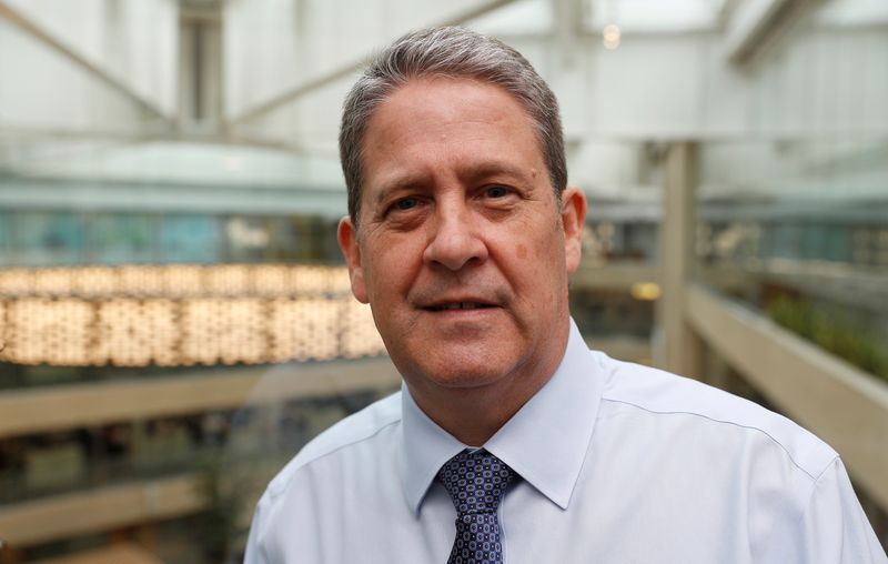 &copy; Reuters. FILE PHOTO: Chief Executive of Coutts private bank, Peter Flavel, poses for a photograph by the atrium inside the bank in London, Britain October 10, 2017.  Picture taken October 10, 2017. REUTERS/Peter Nicholls/File Photo