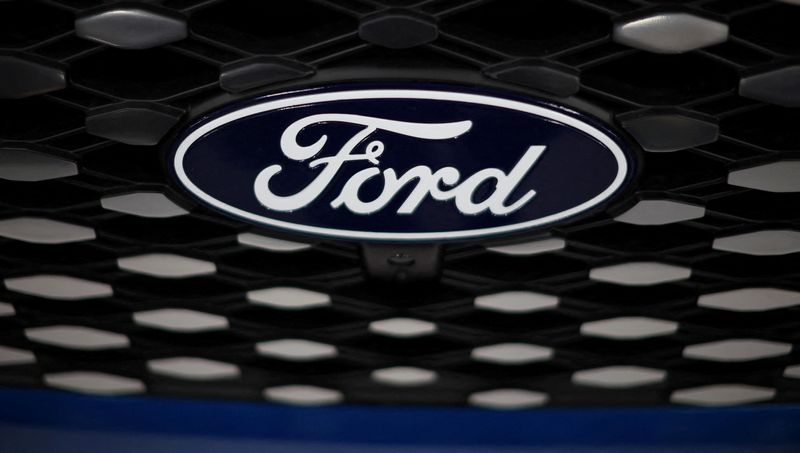 &copy; Reuters. FILE PHOTO: A logo is seen on the grill of an E-transit concept vehicle during a press event at the Ford Halewood transmissions plant in Liverpool, Britain, December 1, 2022. REUTERS/Phil Noble/File Photo