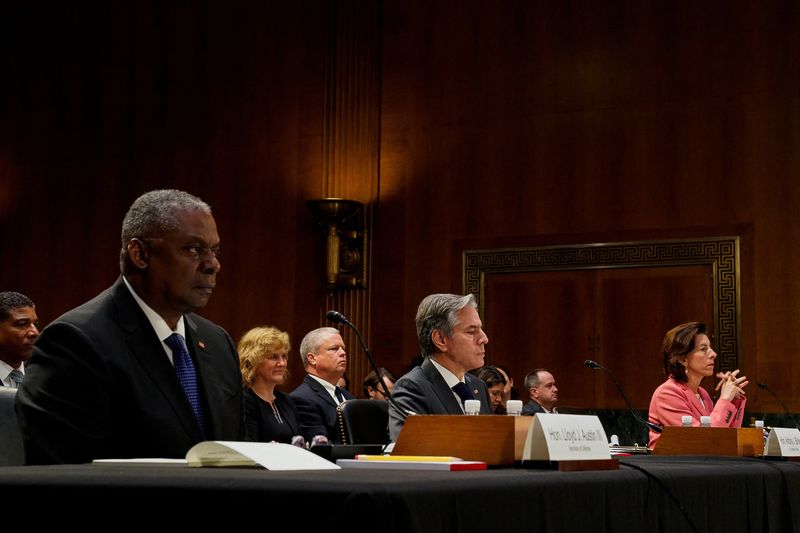 &copy; Reuters. U.S. Defense Secretary Lloyd Austin, Secretary of State Antony Blinken and Commerce Secretary Gina Raimondo listen during a Senate Appropriations Committee hearing titled "A Review of the President’s Fiscal Year 2024 Budget Request: Investing in U.S. Se