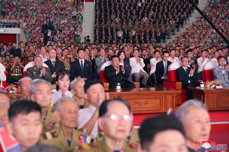 &copy; Reuters. North Korean leader Kim Jong Un, along with Russia's defense minister Sergei Shoigu and Chinese Communist Party Politburo member Li Hongzhong, attends a performance in Pyongyang, in this image released by North Korea's Korean Central News Agency on July 2