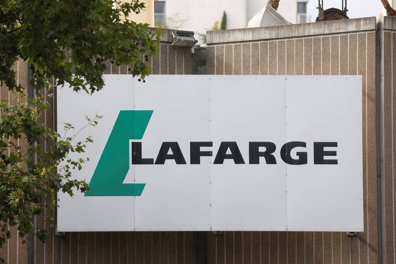 &copy; Reuters. FILE PHOTO: The logo of French concrete maker Lafarge is seen on the plant of Bercy on the banks of the river Seine in Paris, France, September 3, 2020. REUTERS/Charles Platiau/File Photo