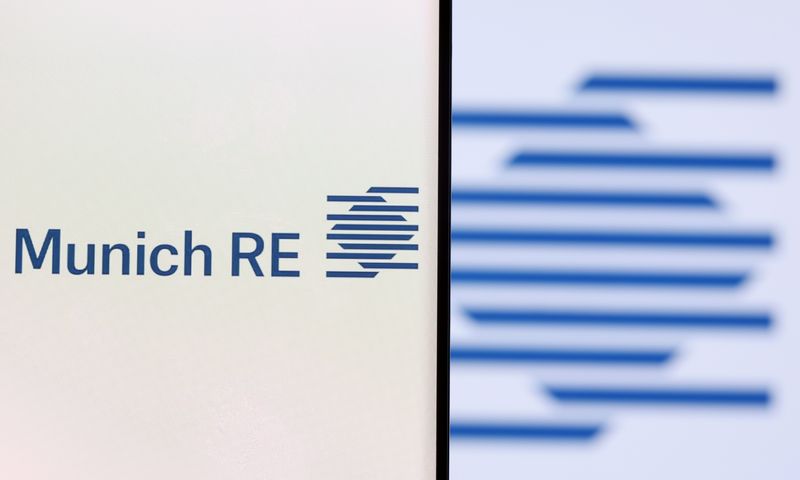 &copy; Reuters. Munich Re Group logo is seen on a smartphone in front of displayed same logo in this illustration taken, December 1, 2021. REUTERS/Dado Ruvic/Illustration/File photo