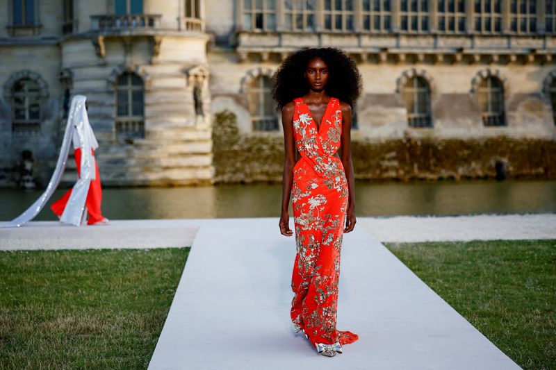 &copy; Reuters. FILE PHOTO: Models present creations by designer Pierpaolo Piccioli as part of his Haute Couture Fall/Winter 2023-2024 collection show for fashion house Valentino at the Chateau de Chantilly near Paris, France, July 5, 2023. REUTERS/Sarah Meyssonnier/File