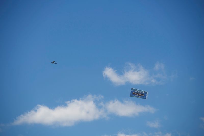 &copy; Reuters. FILE PHOTO: A plane flies an advertisement for Trojan Bareskin condoms over the concert grounds on the second day of the Firefly Music Festival in Dover, Delaware U.S., June 15, 2018.  REUTERS/Mark Makela/File Photo