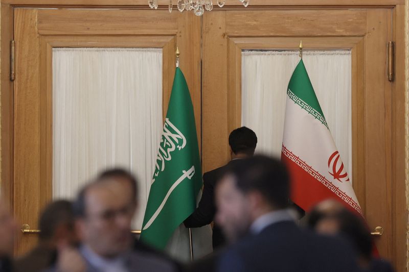 &copy; Reuters. العلمان السعودي والإيراني داخل مقر وزارة الخارجية الإيرانية قبل عقد مؤتمر صحفي في  17 يونيو حزيران 2023. صورة من وكالة أنباء غرب آسيا حصلت عليه