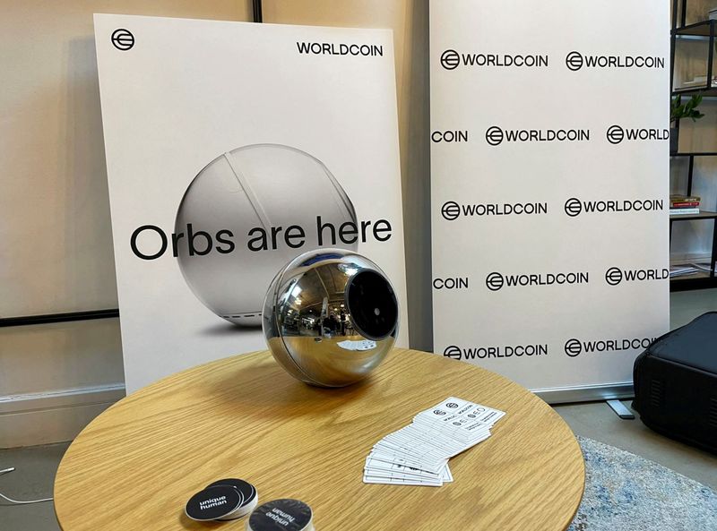 &copy; Reuters. FILE PHOTO: Stickers handed out to people who signed up for WorldCoin are seen at a sign-up site in Shoreditch, East London, Britain July 24, 2023. REUTERS/Elizabeth Howcroft/File Photo