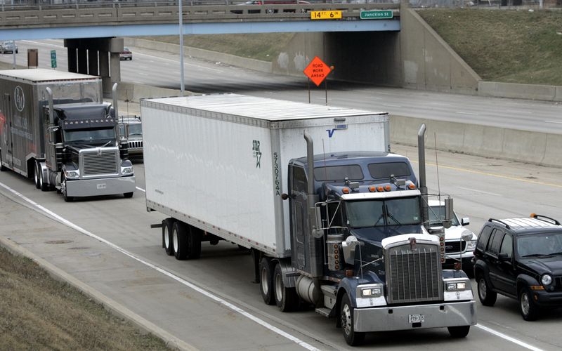 &copy; Reuters. FILE PHOTO: Freight trucks are driven on the Fisher freeway in Detroit, Michigan March 27, 2009. REUTERS/Rebecca Cook/File Photo