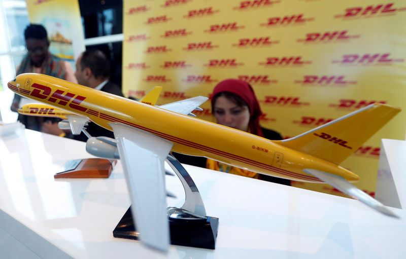 &copy; Reuters. FILE PHOTO-A model of a plane bearing the logo of the German postal and logistics group Deutsche Post DHL is displayed during Africa 2018 Forum at the Red Sea resort of Sharm el-Sheikh, Egypt December 9, 2018. REUTERS/Amr Abdallah Dalsh/File Photo