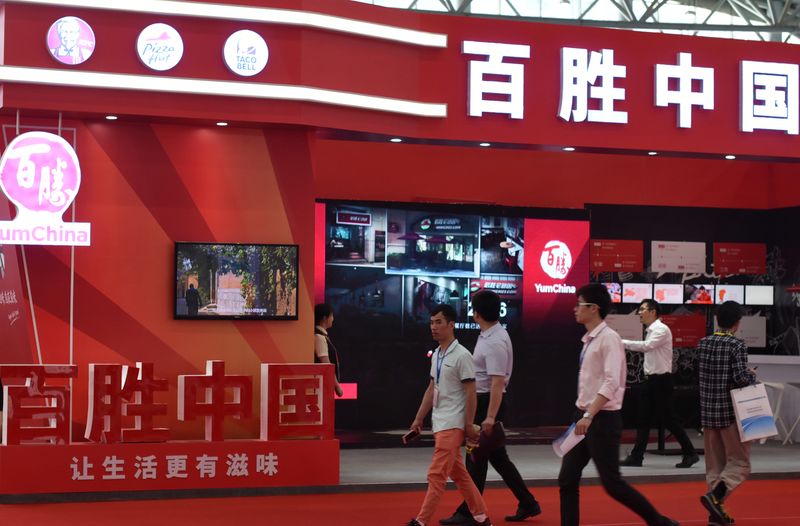&copy; Reuters. FILE PHOTO-The booth of fast food restaurant company Yum China Holdings Inc. is seen at an investment and trade fair in Hefei, Anhui province, China May 17, 2017. Picture taken May 17, 2017.  REUTERS/Stringer/File Photo