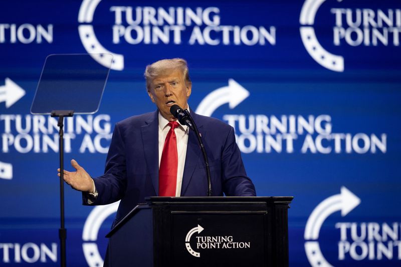 &copy; Reuters. FILE PHOTO: Former U.S. President and Republican presidential candidate Donald Trump gestures as he speaks during the Turning Point Action Conference in West Palm Beach, Florida, U.S. July 15, 2023. REUTERS/Marco Bello/File Photo