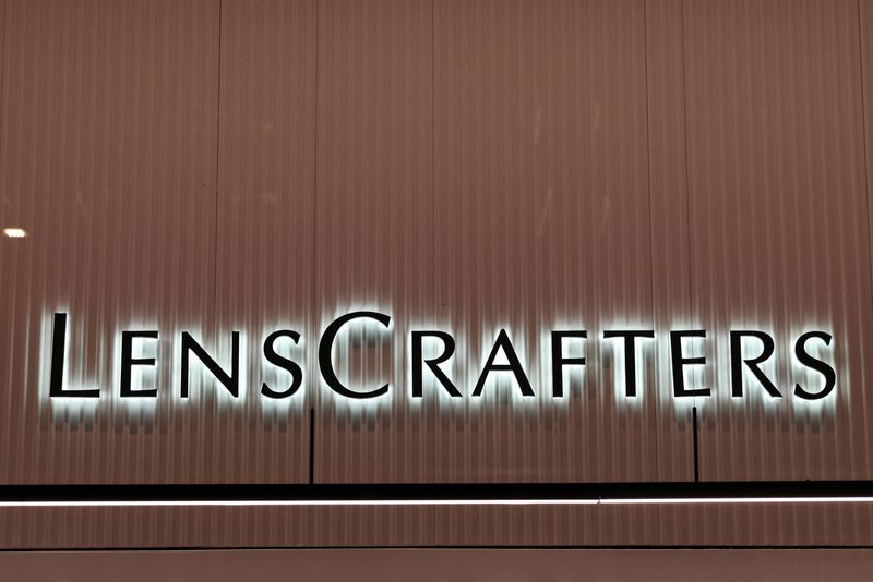 © Reuters. FILE PHOTO: Signage is pictured at a LensCrafters store, a brand owned by EssilorLuxottica SA, in Manhattan, New York City, U.S., November 30, 2021. REUTERS/Andrew Kelly/File Photo