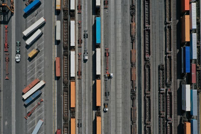 &copy; Reuters. FILE PHOTO: An aerial view of shipping containers and freight railway trains ahead of a possible strike if there is no deal with the rail worker unions, at the BNSF Los Angeles Intermodal Facility rail yard in Los Angeles, California, U.S., September 15, 