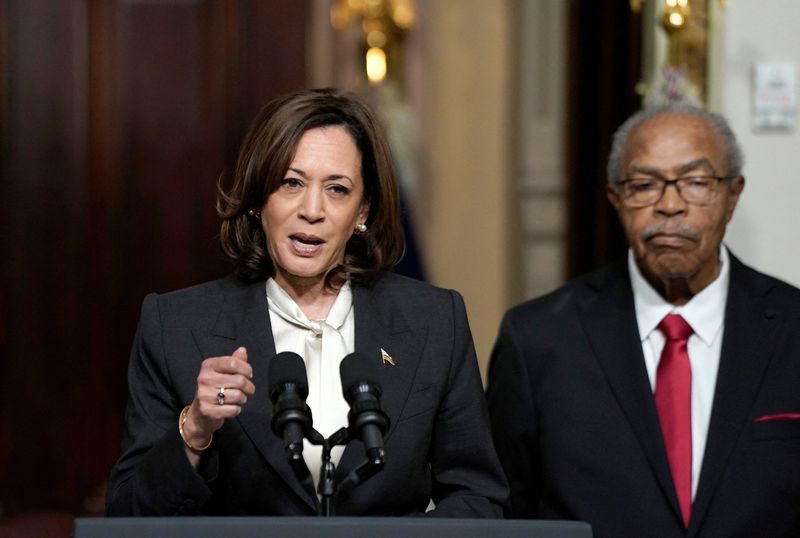 &copy; Reuters. U.S. Vice President Kamala Harris, flanked by Reverend Wheeler Parker, Jr., speaks ahead of a signing by the U.S. President of a proclamation to establish the Emmett Till and Mamie Till-Mobley National Monument in Illinois and Mississippi, at the White Ho