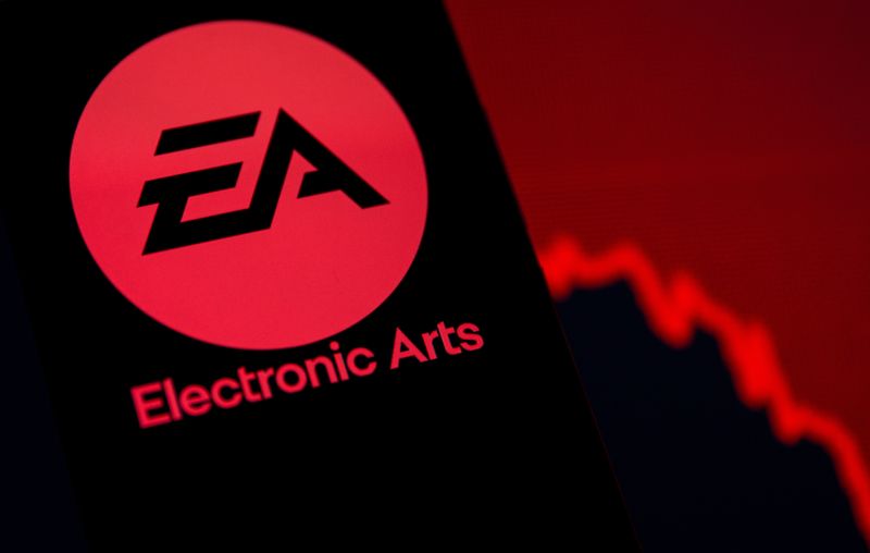 © Reuters. A smartphone with the Electronic Arts logo is seen in front of a displayed stock graph in this illustration taken September 16, 2021. REUTERS/Dado Ruvic/Illustration