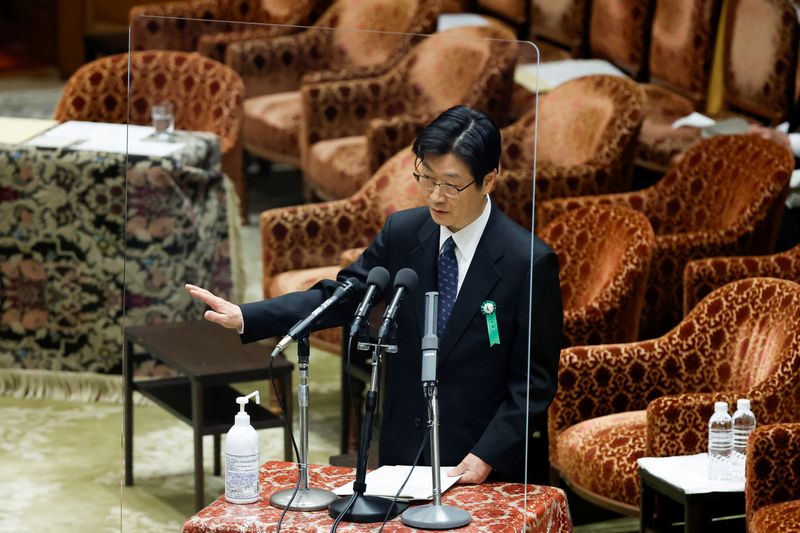 &copy; Reuters. FILE PHOTO-The Japanese government's nominee for the Bank of Japan (BOJ) Deputy Governor Shinichi Uchida speaks during a hearing session at the lower house of the parliament in Tokyo, Japan, February 24, 2023.  REUTERS/Issei Kato/File Photo