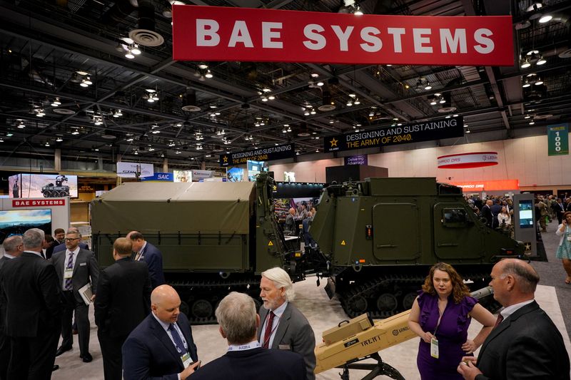 &copy; Reuters. FILE PHOTO-People gather at the BAE Systems' booth during the Association of the United States Army (AUSA) Global Force Symposium & Exposition in Huntsville, Alabama, U.S. March 28, 2023.  REUTERS/Cheney Orr/File Photo