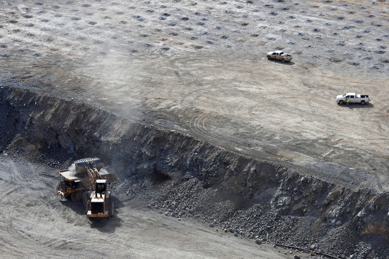 &copy; Reuters. FILE PHOTO: A wheel loader operator fills a truck with ore at the MP Materials rare earth mine in Mountain Pass, California, U.S. January 30, 2020. REUTERS/Steve Marcus/File Photo