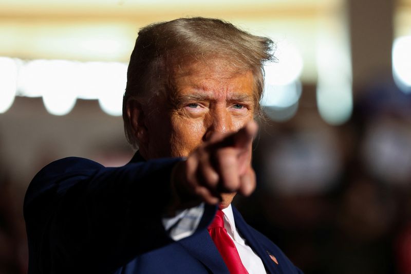 © Reuters. Former U.S. President and Republican presidential candidate Donald Trump gestures as he holds a campaign rally in Erie, Pennsylvania, U.S., July 29, 2023. REUTERS/Lindsay DeDario