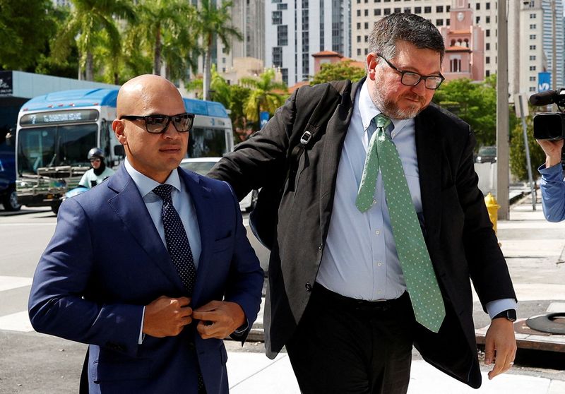 &copy; Reuters. FILE PHOTO: Walt Nauta, personal aide to former U.S. President Donald Trump, who is expected to face charges in connection to the mishandling of classified documents, and his lawyer Stanley Woodward, arrive at the James Lawrence King Federal Justice Build