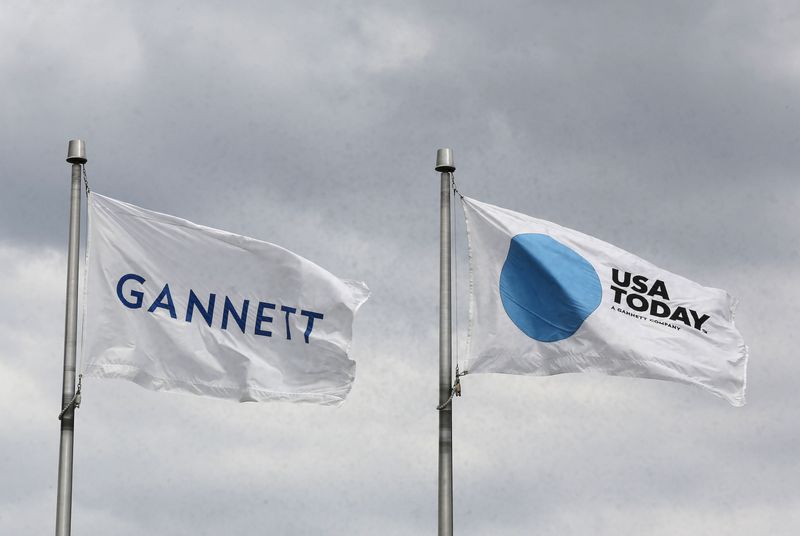&copy; Reuters. The corporate flags for the Gannett Co and its flagship newspaper, USA Today, fly outside their corporate headquarters in McLean, Virginia, July 23, 2013. REUTERS/Larry Downing/File photo