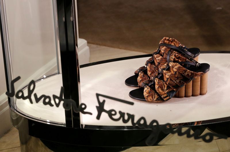 &copy; Reuters. FILE PHOTO: A pair of shoes of Italian luxury shoemaker Salvatore Ferragamo is displayed in the window of the company's store in Zurich, Switzerland, April 25, 2019. REUTERS/Arnd Wiegmann/File Photo