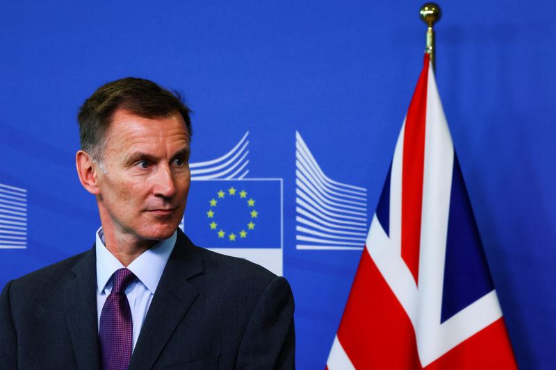 &copy; Reuters. FILE PHOTO: British Chancellor of the Exchequer Jeremy Hunt looks on during the press conference on the day he signs cooperation pact on financial services with European Commissioner for Financial Stability, Financial Services and the Capital Markets Unio