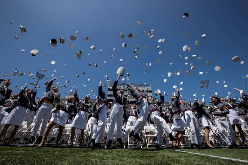 &copy; Reuters. FILE PHOTO: Graduation cadets toss their hats into the air at the end of the 2023 graduation ceremony at the United States Military Academy (USMA), at Michie Stadium in West Point, New York, U.S., May 27, 2023. REUTERS/Eduardo Munoz/File Photo