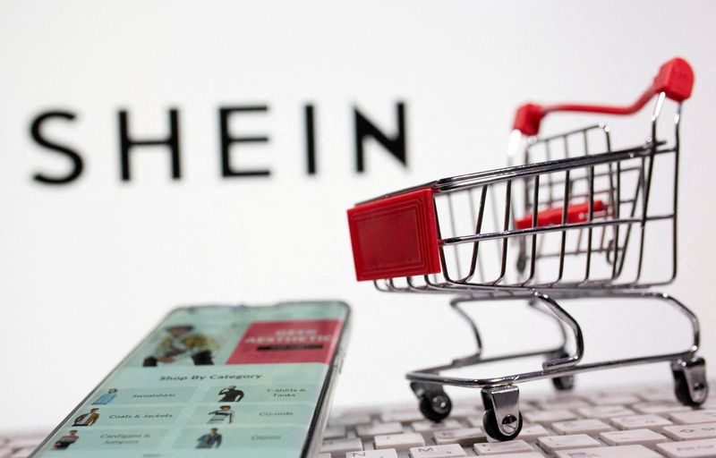 &copy; Reuters. A keyboard and a shopping cart are seen in front of a displayed Shein logo in this illustration picture taken October 13, 2020. REUTERS/Dado Ruvic/Illustration