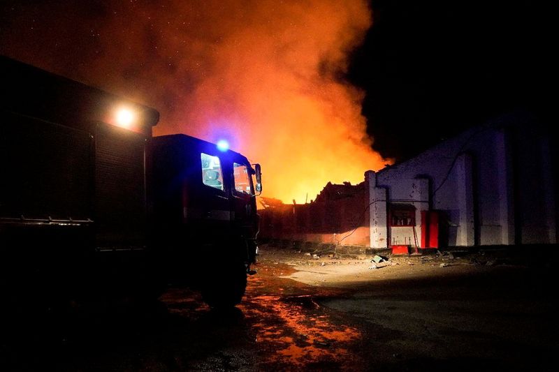 &copy; Reuters. A fire truck is seen at a site of a fire in the aftermath of an attack, amid Russia's attack on Ukraine, given as Starokostiantyniv, Khmelnytskyi Region, Ukraine, in this handout photo released on August 6, 2023, courtesy of the Khmelnytskyi region admini