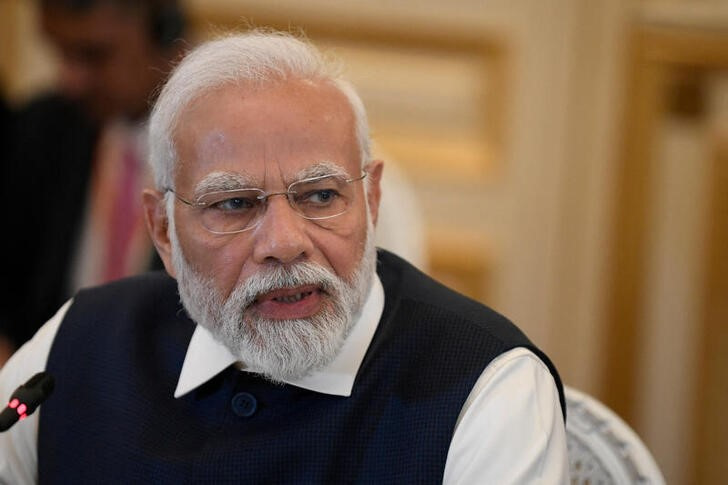 &copy; Reuters. インドのサンジープ・チョプラ食品長官は４日、４０％の小麦輸入税の引き下げないし廃止を検討していると明らかにした。写真は、インドのモディ首相。２０２３年７月１４日にパリで撮