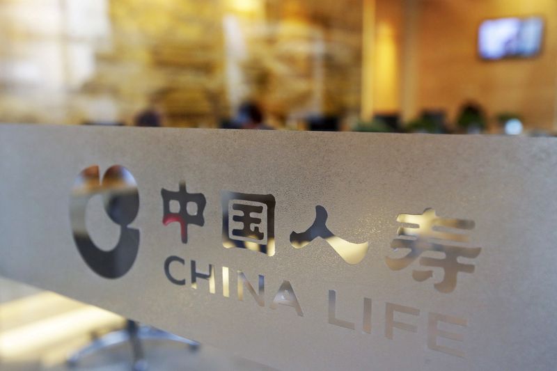 &copy; Reuters. FILE PHOTO: Logo of China Life Insurance is seen on a door at a branch in Beijing, China, March 24, 2016. REUTERS/Jason Lee/File Photo
