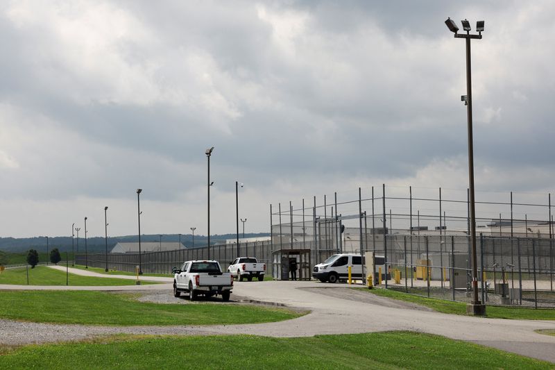 &copy; Reuters. A detainee transport van exits the Moshannon Valley Processing Center, a former prison repurposed as an immigration detention facility operated by the GEO Group under contract with the U.S. Immigration and Customs Enforcement, in Philipsburg, Pennsylvania