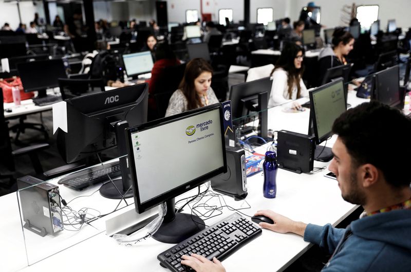 &copy; Reuters. FILE PHOTO: Employees work at headquarters MercadoLibre (Online marketplace company) in Sao Paulo, Brazil, July 10, 2017. REUTERS/Nacho Doce/File Photo