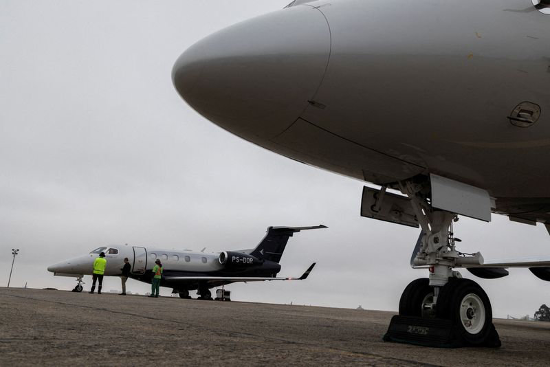 &copy; Reuters. FILE PHOTO: A view of Embraer Phenom 300E aircraft before the Latin American Business Aviation Conference & Exhibition fair (LABACE) at Congonhas Airport in Sao Paulo, Brazil August 6, 2022. REUTERS/Roosevelt Cassio/File Photo