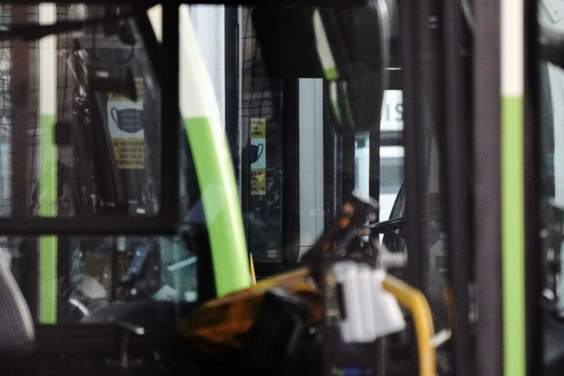 &copy; Reuters. FILE PHOTO: Signage requiring mask use is seen inside Proterra Catalyst BE35 electric buses parked at an L.A. City Transportation Department (LADOT) DASH transit bus maintenance facility in downtown Los Angeles, California, U.S., August 21, 2021. REUTERS/