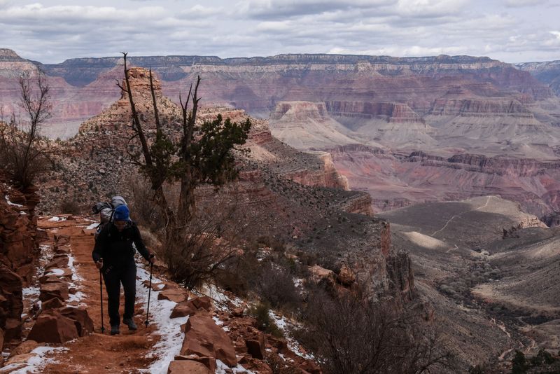 &copy; Reuters. FILE PHOTO: A person hikes on the Bright Angel Trail in the Grand Canyon near Grand Canyon Village, Arizona, U.S., February 22, 2018. REUTERS/Stephanie Keith/File Photo