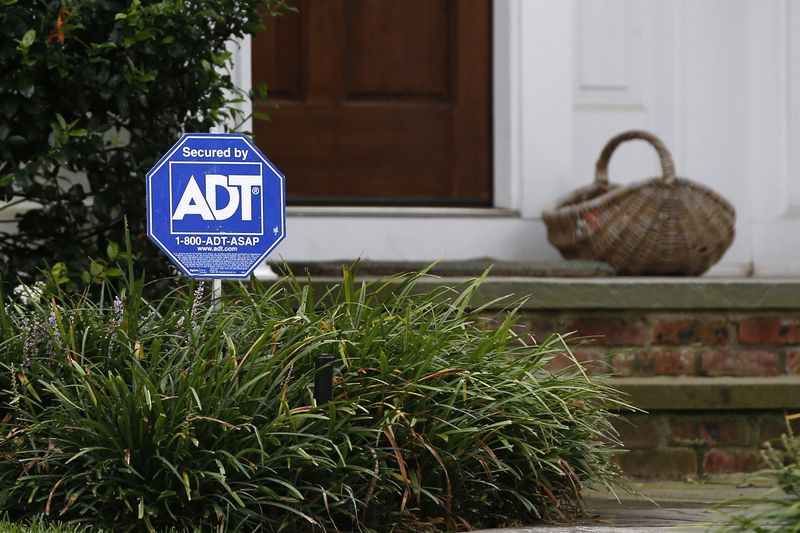 &copy; Reuters. FILE PHOTO: A security sign for ADT is seen outside a home in Port Washington, New York, September 30, 2014. REUTERS/Shannon Stapleton/File Photo