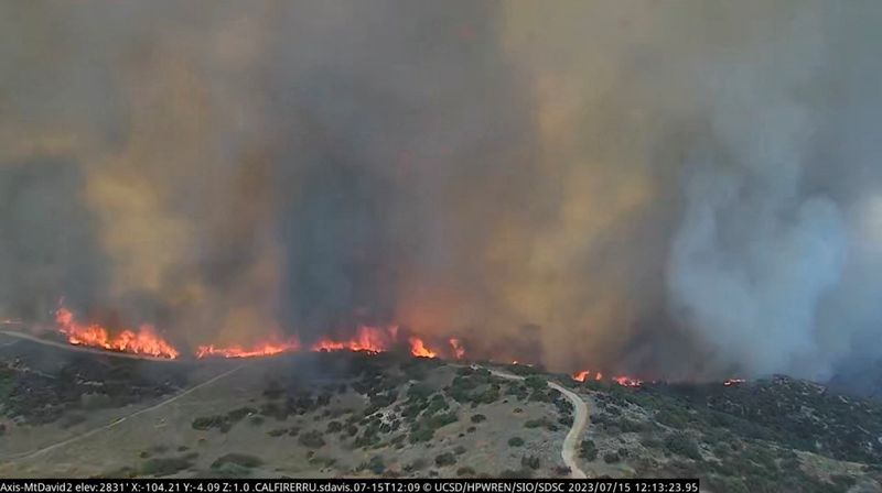 &copy; Reuters. FILE PHOTO: The Rabbit Fire burns in Riverside County, California, U.S., July 15, 2023 as seen in this screen grab taken from a handout timelapse video. ALERTCalifornia/UC San Diego/Handout via REUTERS/File Photo
