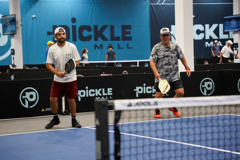 © Reuters. People play Picleball during the opening of 