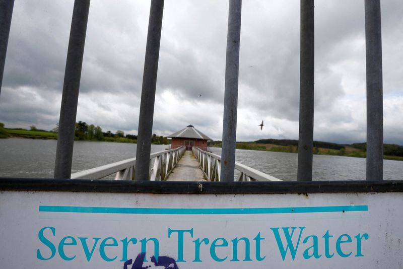 &copy; Reuters. FILE PHOTO: A Severn Trent sign hangs on a gate at Cropston Reservoir in Cropston, central England, May 15, 2013. REUTERS/Darren Staples/File Photo