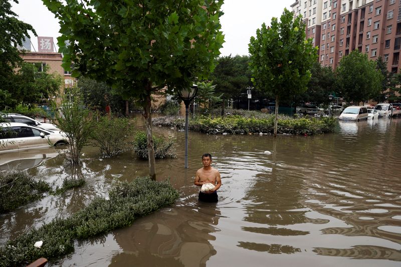 &copy; Reuters. Área alagada por tufão
3/08/2023
REUTERS/Tingshu Wang