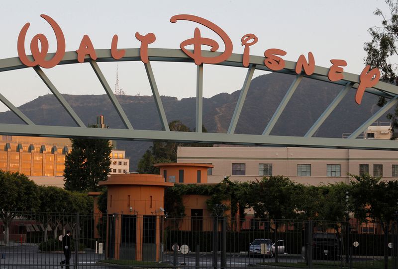 &copy; Reuters. FILE PHOTO: A portion of the signage at the main gate of The Walt Disney Co. is pictured in Burbank, California May 7, 2012.  REUTERS/Fred Prouser