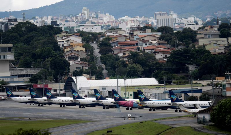 &copy; Reuters. Airplanes of Brazilian airline Azul are seen at the Pampulha airport after the company suspended several flights, amid a coronavirus disease (COVID-19) outbreak, in Belo Horizonte, Brazil, April 2, 2020. REUTERS/Washington Alves