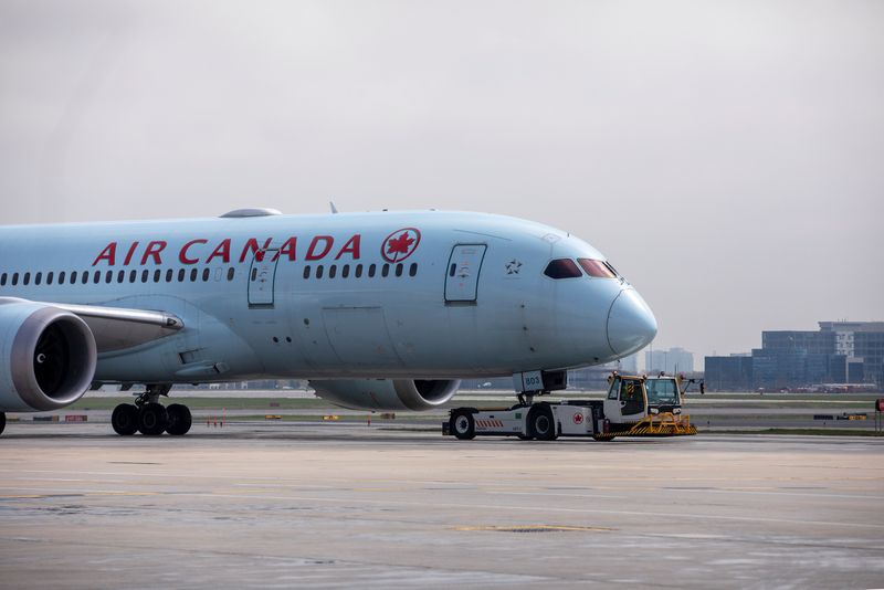 Air Canada posts quarterly profit versus year-ago loss